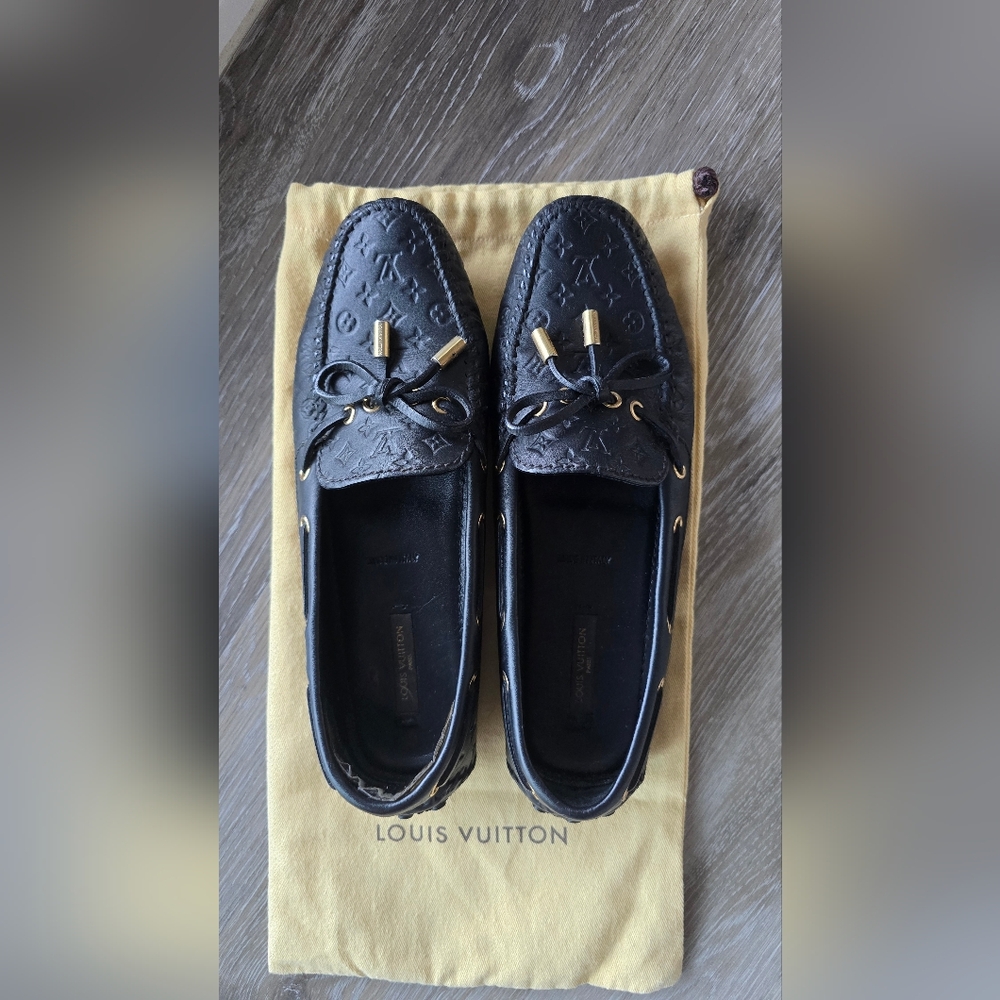 Louis Vuitton Embossed Black Loafers with Gold Details